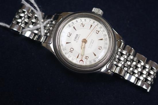 A boxed Oris 25-jewel automatic stainless steel wristwatch.